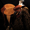 Modified Association Tree - 94 degree bars - #1 choice for fitting powerfull well muscled shoulder horses very well including half drafts - 16 inch seat - cantle is 4 inches high by 12 1/2 inches wide and has a 1 3/4 inch Cheyenne roll - horn is 4 inch high metal dally horn with a heavy mule hide ropping bonnet - Double D rigging set at 7/8ths - previously loved with a couple of generations to love back - half tooled with a classic Sheridan Floral design all hand worked by Keith Valley.